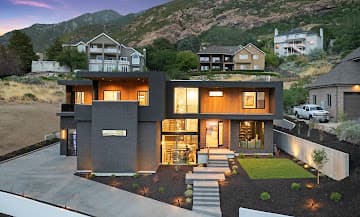 Aerial dusk view of a backyard with mountain views