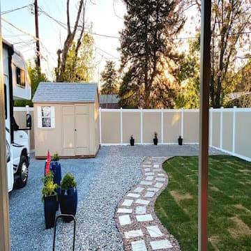 Paver walkway showing the same interlocking-paver technique used on driveways
