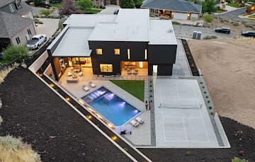 Hardscape pool deck with paver patio and lounge area